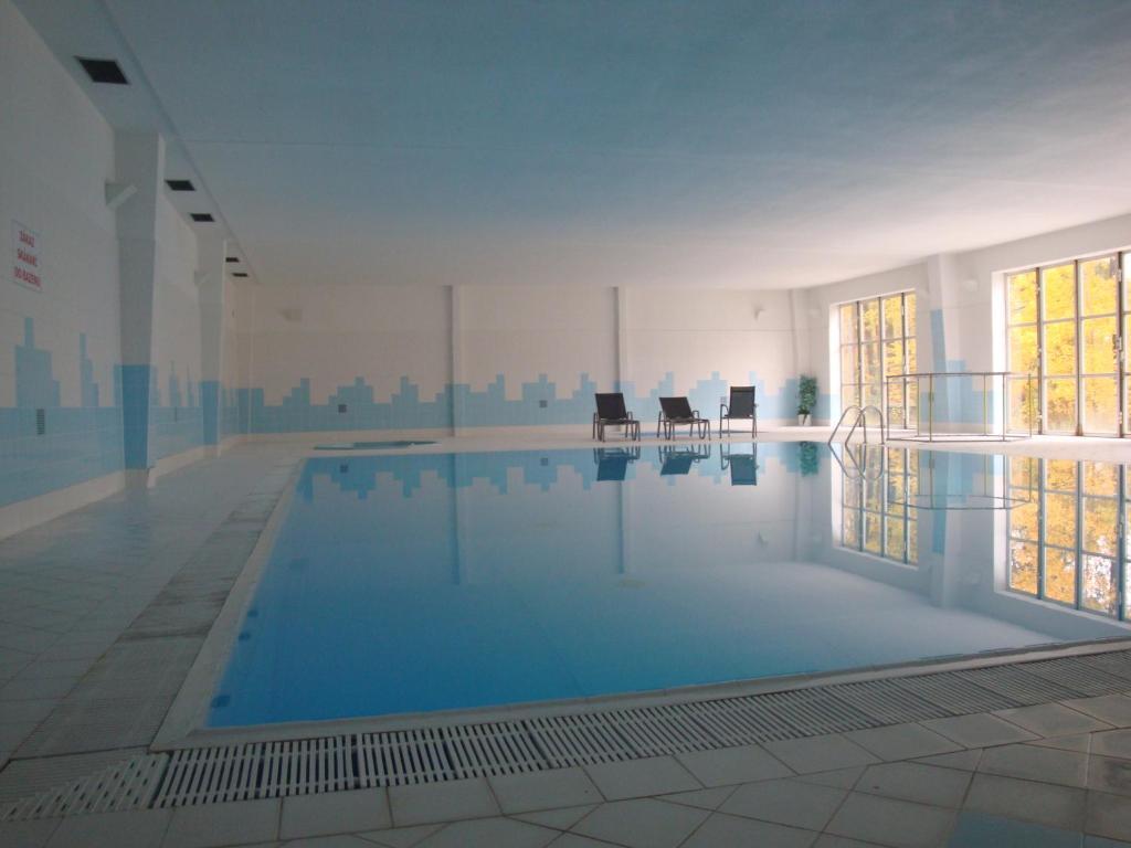 Hotel Astra Tuchlovice Buitenkant foto
